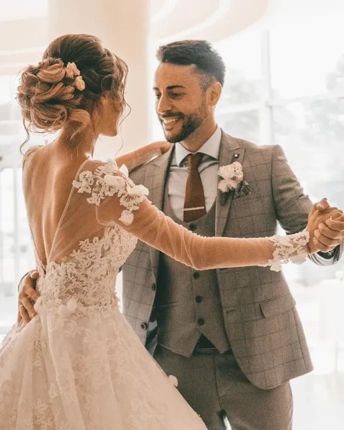 A bride and groom enjoying their first dance